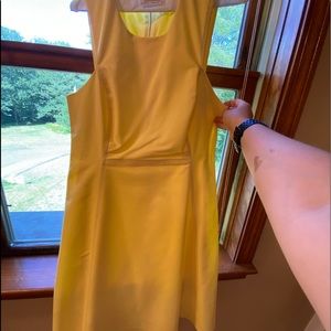Simple sundress by Calvin Klein. Worn 1x. Pale yellow. Zipper back.